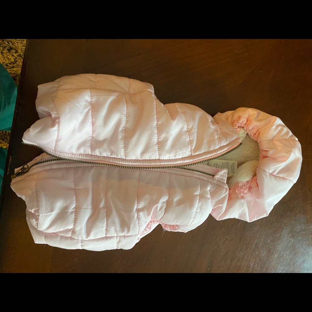 First Impressions puffer vest in pink